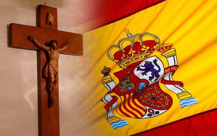 Crucifixo com a bandeira da Espanha (Imagem montada)